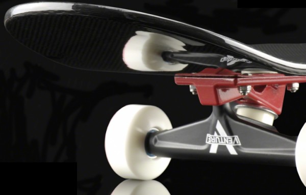 The trucks and wheels of the skateboard.