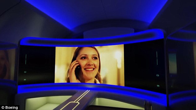 boeing-shows-off-future-cabin-interior-with-led-ceiling-and-curved-screens2
