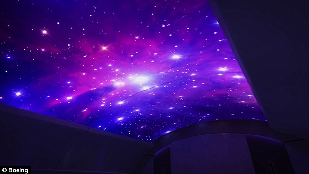 boeing-shows-off-future-cabin-interior-with-led-ceiling-and-curved-screens6